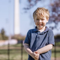 the boy is wearing a blue shirt