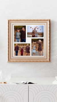 a framed photo of a family sitting in front of a fireplace